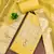 Yellow shimmer banarasi woven unstitched dress material