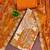 Orange cotton silk printed unstitched dress material