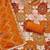 Orange cotton silk printed unstitched dress material