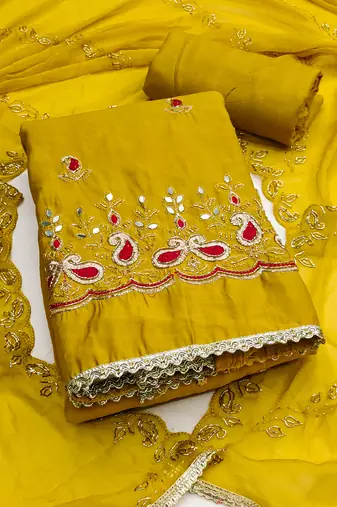 Yellow cotton silk embroidered unstitched dress material
