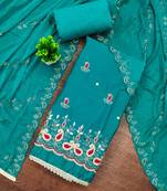 Turquoise cotton silk embroidered unstitched dress material