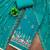 Turquoise cotton silk embroidered unstitched dress material