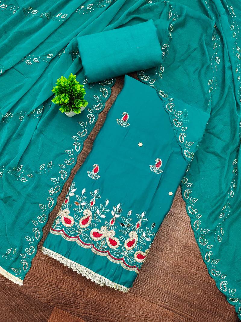 Turquoise cotton silk embroidered unstitched dress material