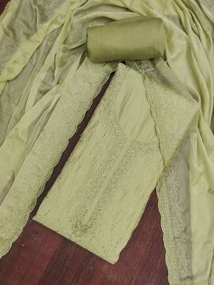 Green cotton silk embroidered unstitched dress material 1
