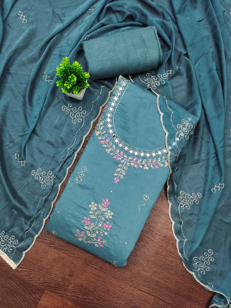 Teal cotton silk embroidered unstitched dress material