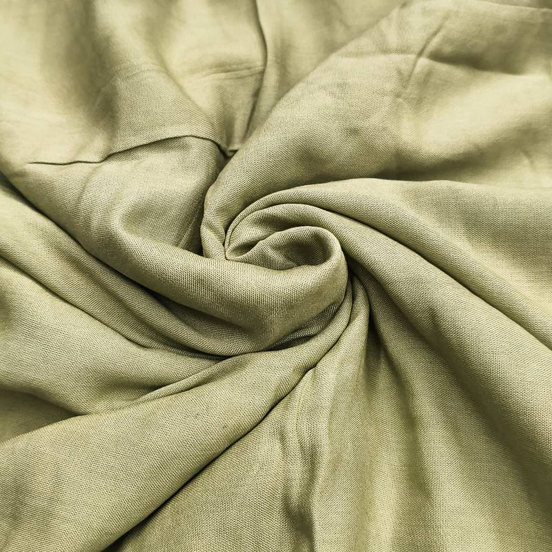 Green cotton silk embroidered unstitched dress material