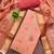 Peach banarasi embellished unstitched dress material