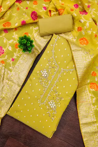 Yellow shimmer banarasi embellished unstitched dress material