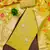 Yellow shimmer banarasi embellished unstitched dress material