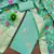 Turquoise shimmer banarasi embellished unstitched dress material