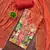 Rust viscose banarasi embellished unstitched dress material