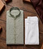 green color jaquard with embroidery patti slik kurta payjama set