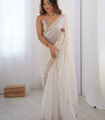 Women's pure georgette floral embroidered saree with satin blouse piece