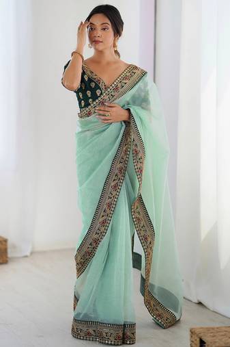 Women's shimmer net traditional motiff embroidered saree with blouse piece