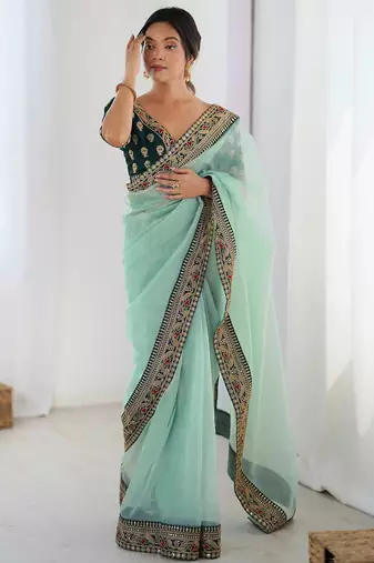 Women's shimmer net traditional motiff embroidered saree with blouse piece