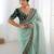 Women's shimmer net traditional motiff embroidered saree with blouse piece
