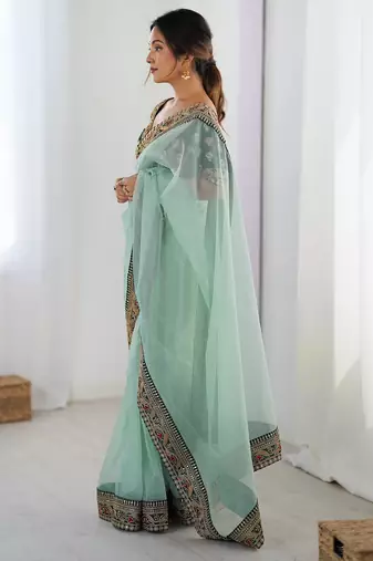 Women's shimmer net traditional motiff embroidered saree with blouse piece