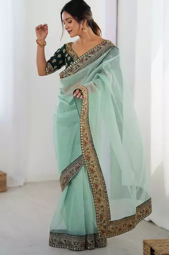 Women's shimmer net traditional motiff embroidered saree with blouse piece