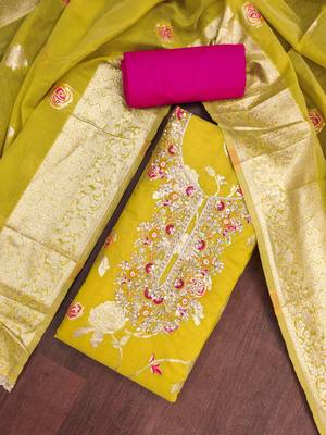Yellow cotton silk woven design unstitched dress material 1