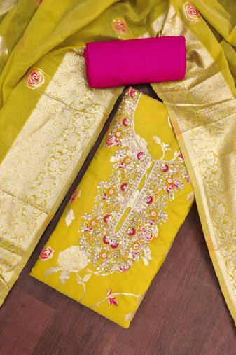 Yellow cotton silk woven design unstitched dress material