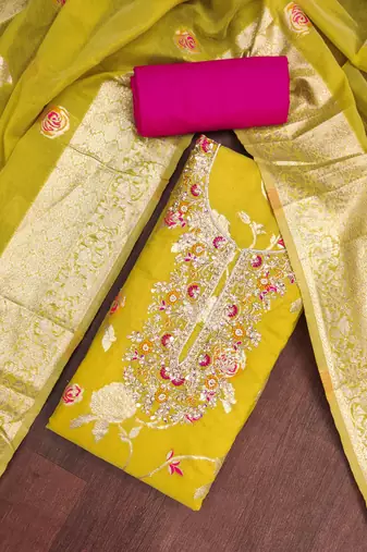 Yellow cotton silk woven design unstitched dress material
