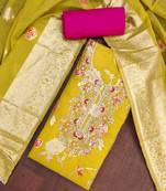 Yellow cotton silk woven design unstitched dress material