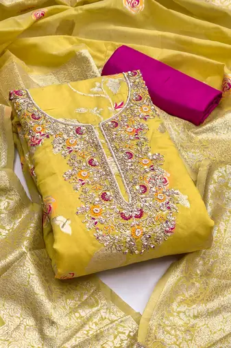 Yellow cotton silk woven design unstitched dress material
