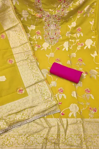 Yellow cotton silk woven design unstitched dress material