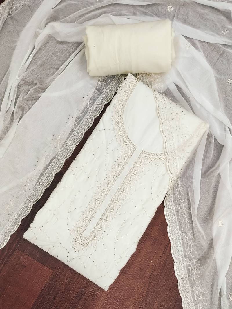 Off white cotton silk embroidered unstitched dress material