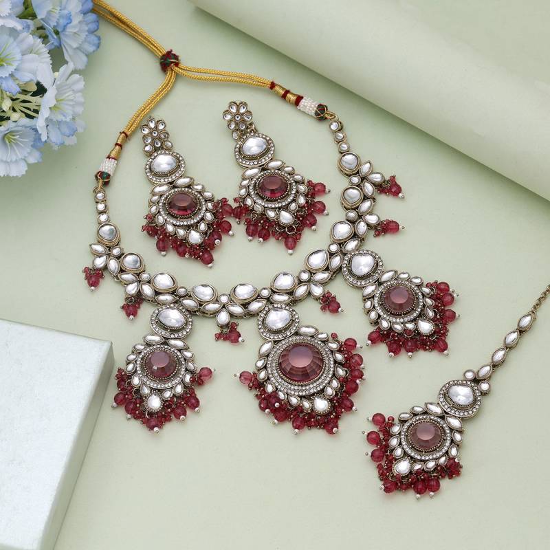 Magenta color kundan necklace set