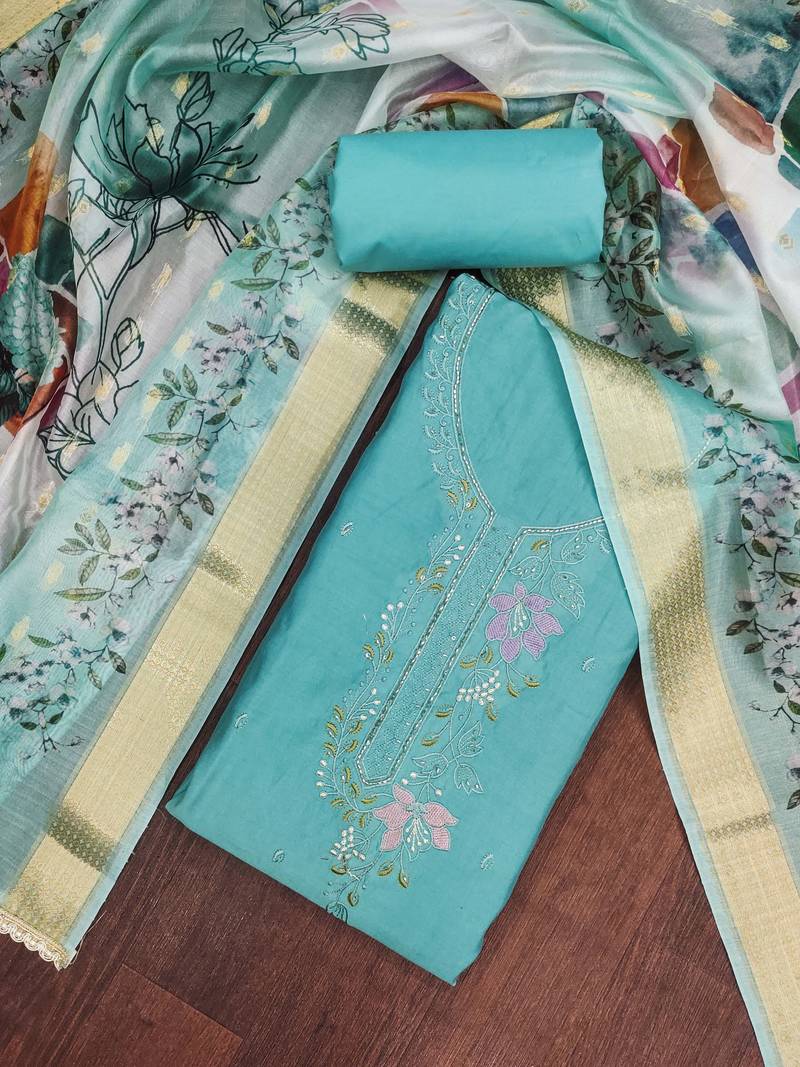 Turquoise cotton silk embroidered unstitched dress material