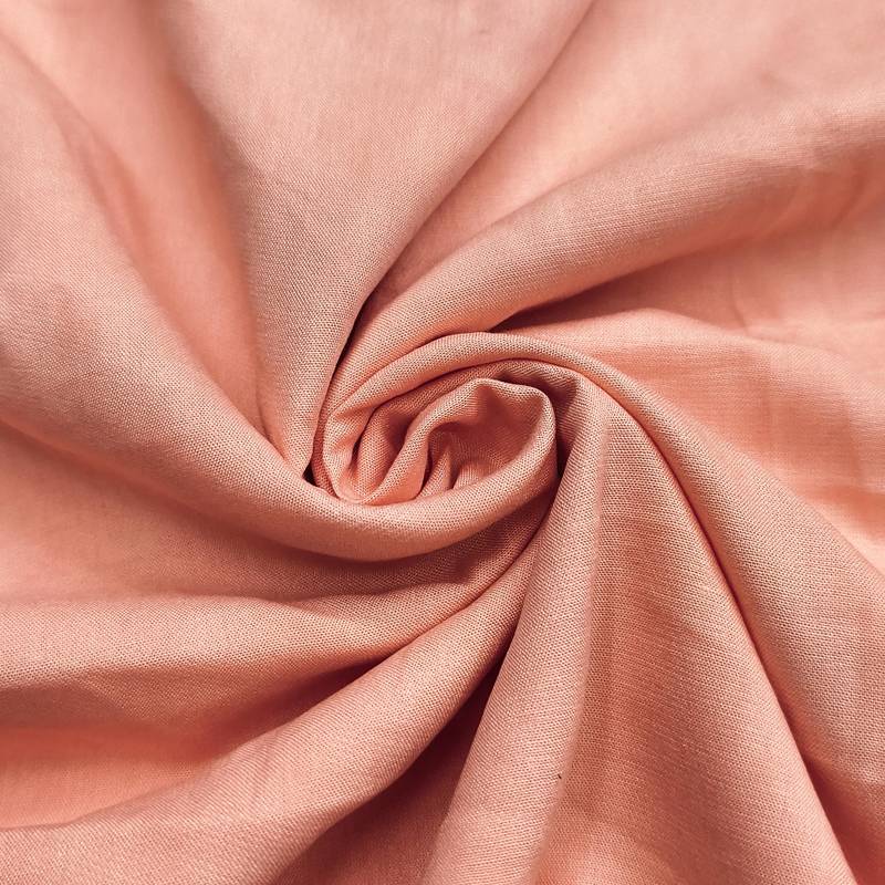 Peach rayon cotton printed unstitched dress material