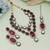 Maroon color kundan necklace set