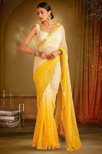 White & yellow mirror work georgette saree