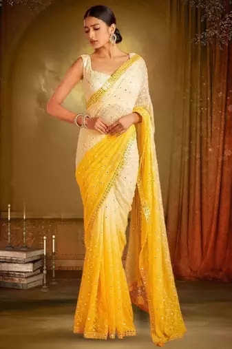 White & yellow mirror work georgette saree