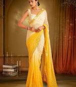 White & yellow mirror work georgette saree