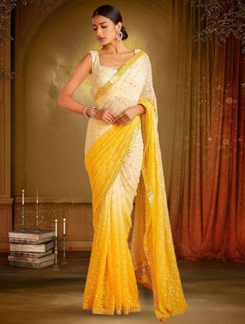 White & yellow mirror work georgette saree