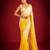 White & yellow mirror work georgette saree