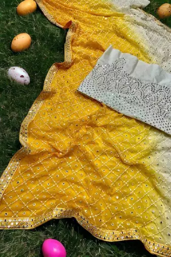 White & yellow mirror work georgette saree