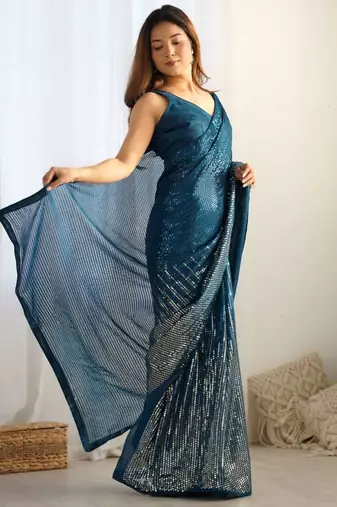 Teal sequin embroidered georgette saree