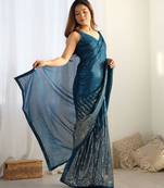 Teal sequin embroidered georgette saree