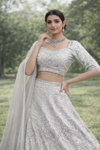 White Color Embroidery Sequins Work Faux Georgette Lehenga Choli Dupatta Set