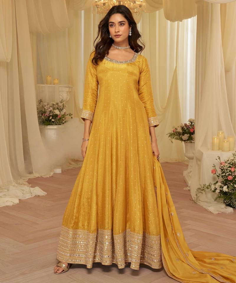 Yellow chinon free size stitched jacquard anarkali suit with codding dori & sequence work