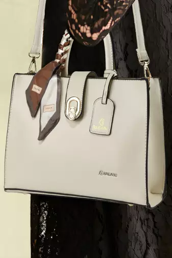 Handbag, detachable sling strap