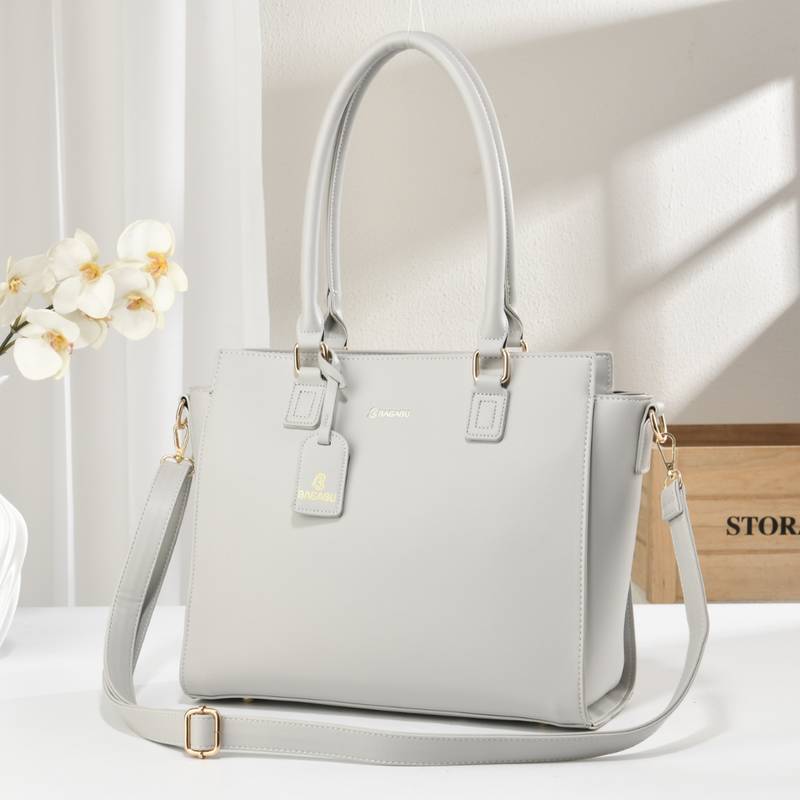 Handbag, detachable sling strap