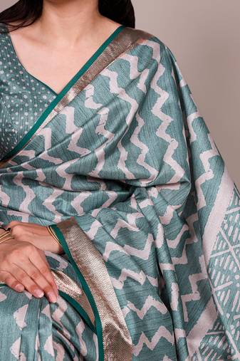 Premium tassar silk printed saree with glossy viscose border