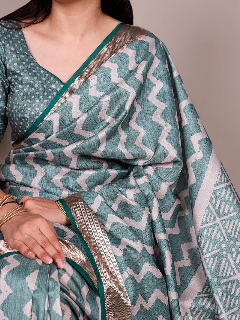 Premium tassar silk printed saree with glossy viscose border