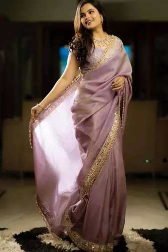 Lavender color embroidered tissue silk blend saree