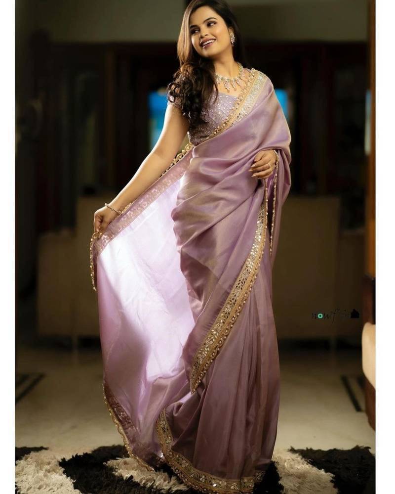 Lavender color embroidered tissue silk blend saree