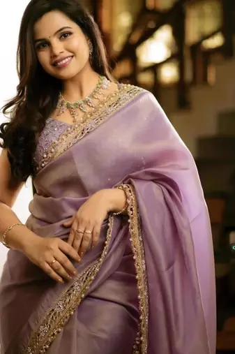 Lavender color embroidered tissue silk blend saree